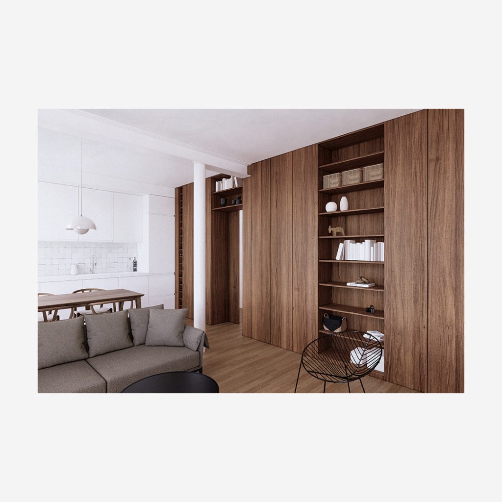 Salon rénové d’un appartement comprenant un mur de rangements et des étagères en bois